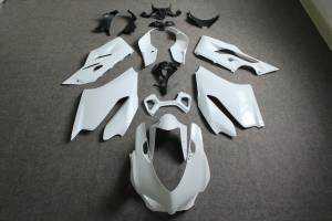 Complete and unpainted fairings in abs with front fender INJ 