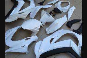 Complete and unpainted fairing in abs with front fender INJ 